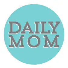 The daily mom logo features bold, gray sans-serif lettering centered within a solid light blue circular background.