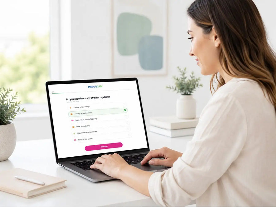 Silver laptop displaying a health assessment questionnaire on its screen