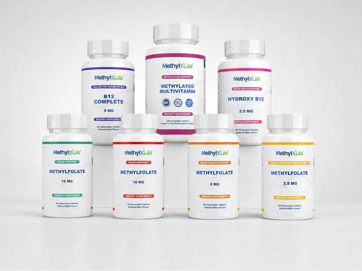 White plastic bottles with colorful labels featuring the ’methyl-life’ brand name and various vitamin supplement formulations.